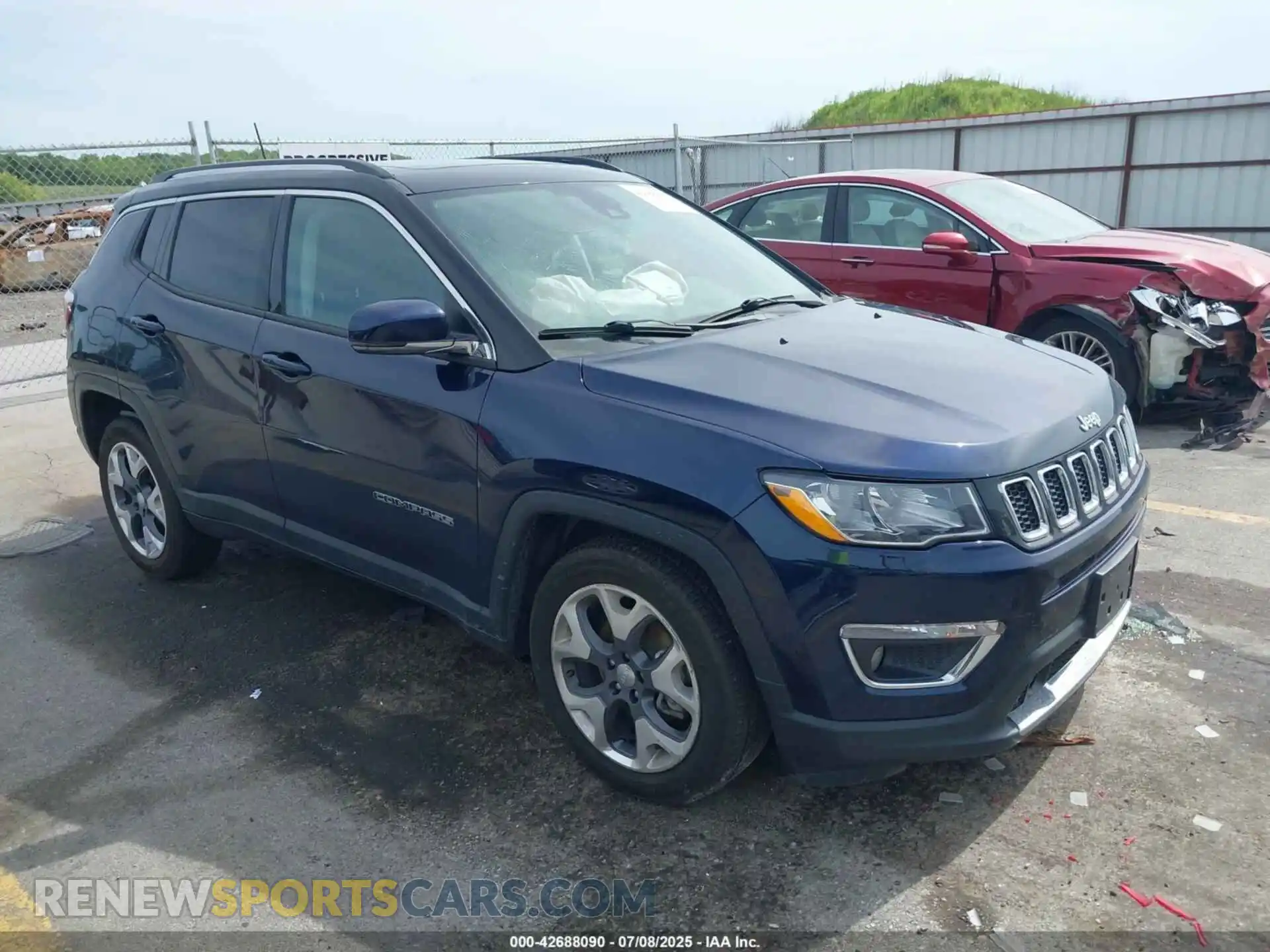 1 Photograph of a damaged car 3C4NJDCBXMT583497 JEEP COMPASS 2021