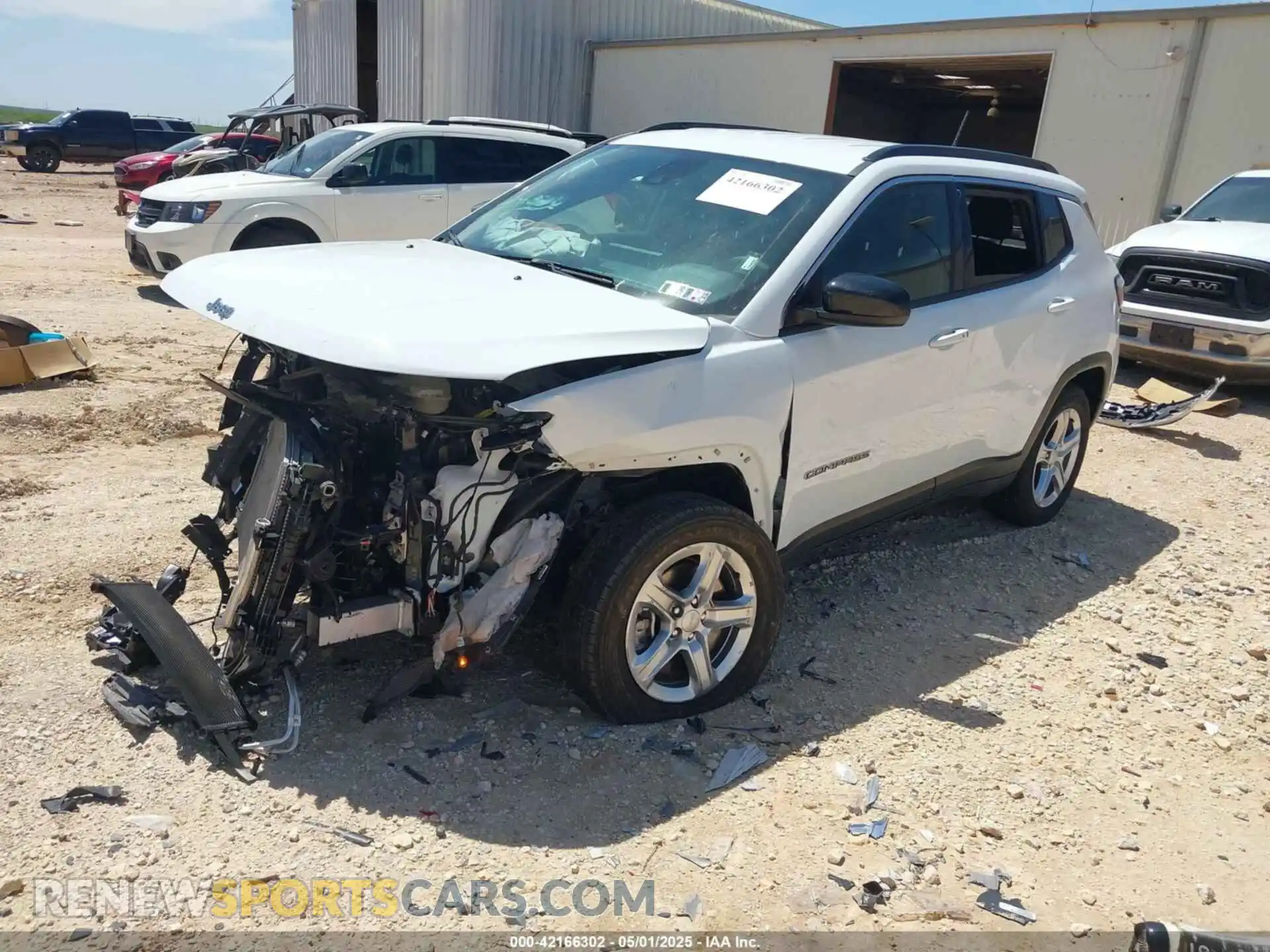 2 Photograph of a damaged car 3C4NJDBN4RT604198 JEEP COMPASS 2024