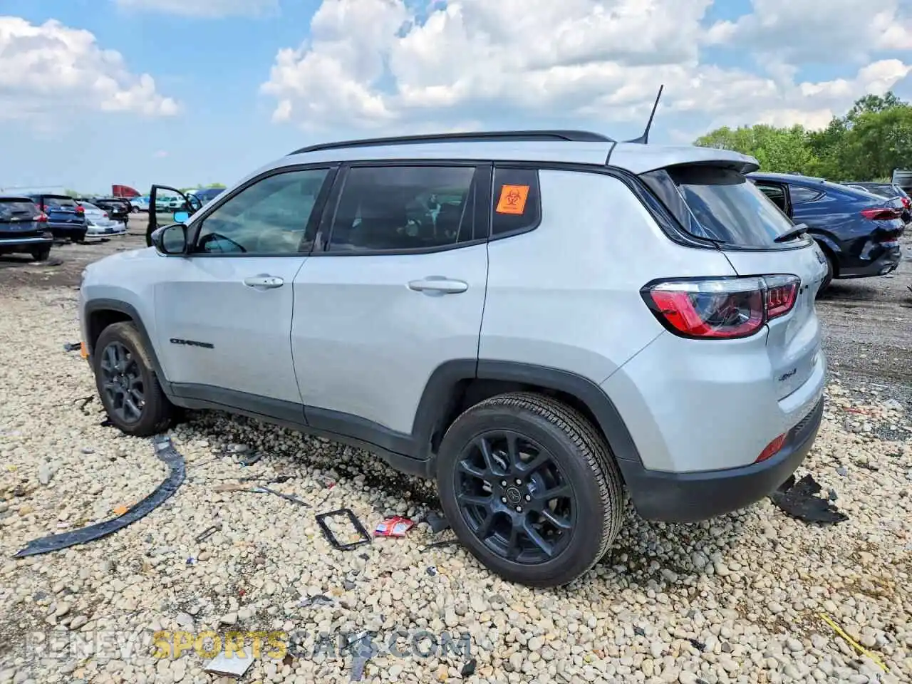 2 Photograph of a damaged car 3C4NJDBN1TT161242 JEEP COMPASS 2026