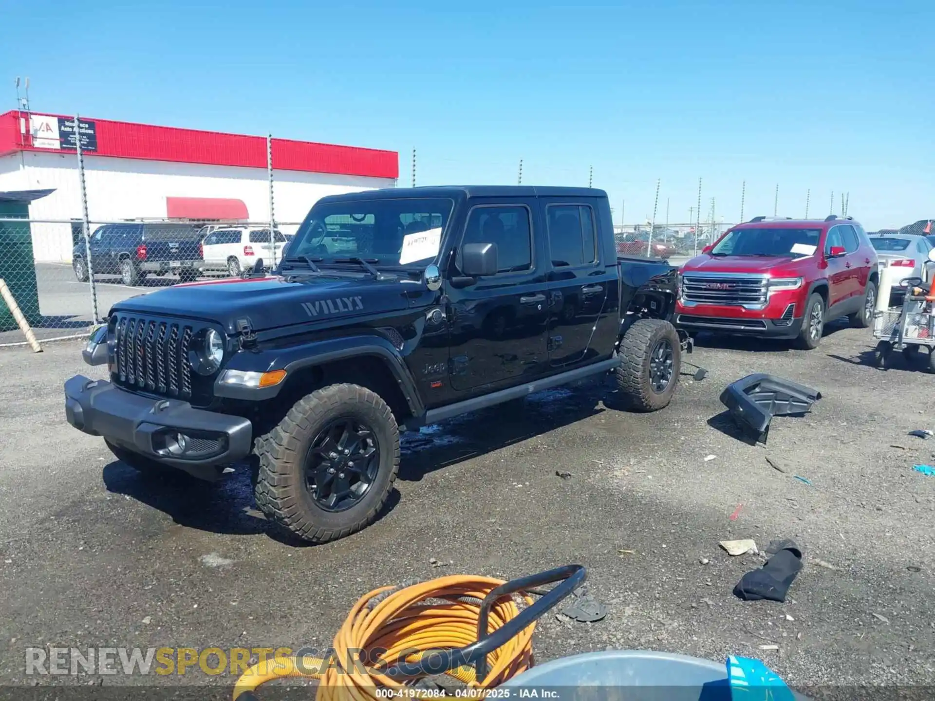 2 fotografías del automóvil dañado 1C6HJTAG1PL526229 JEEP GLADIATOR 2023