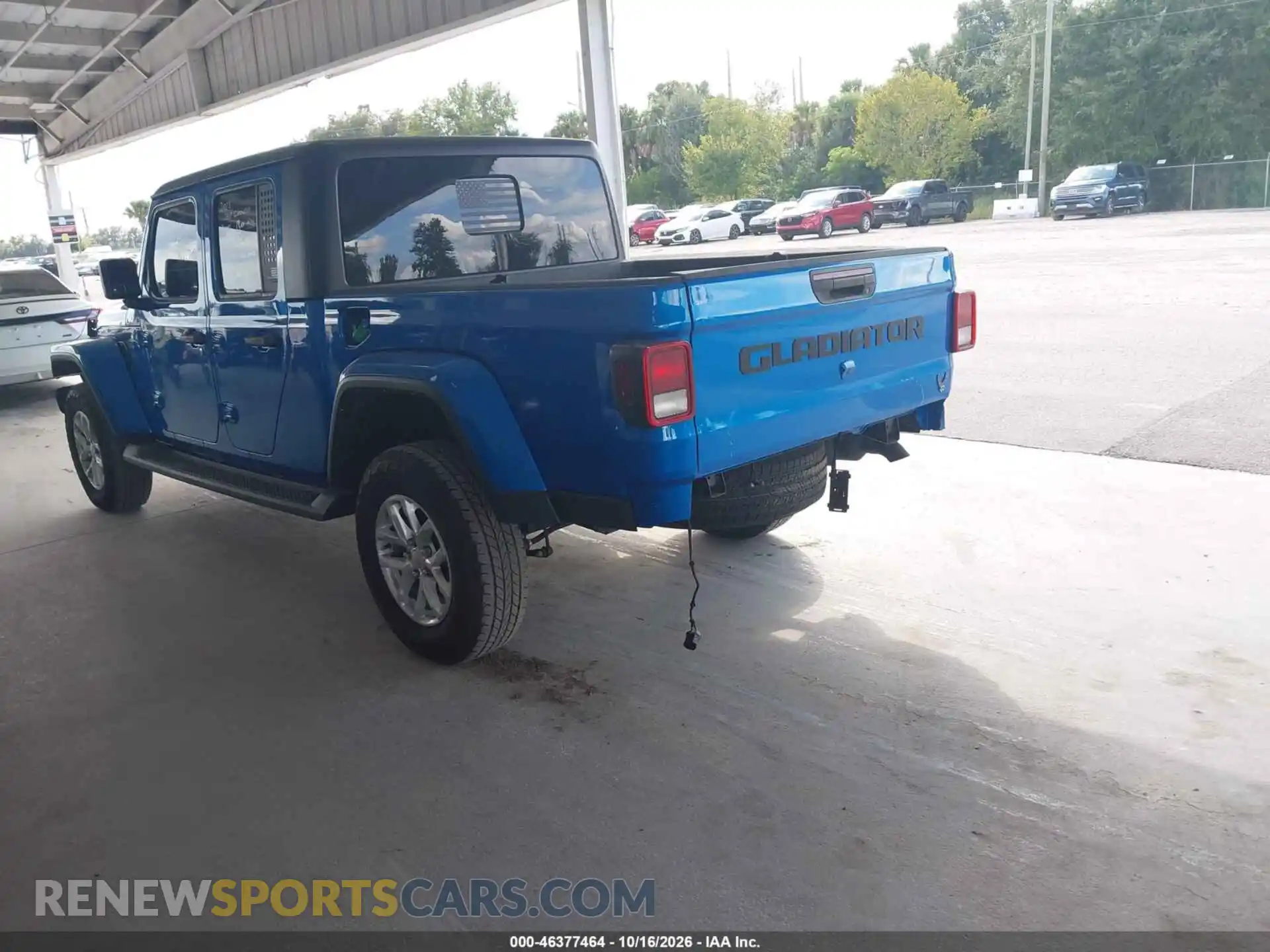 3 Photograph of a damaged car 1C6JJTAM3PL591011 JEEP GLADIATOR 2023