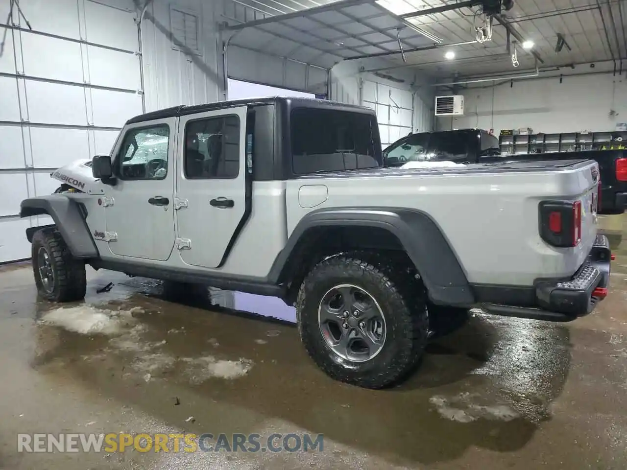 2 Photograph of a damaged car 1C6JJTBG9PL571032 JEEP GLADIATOR 2023