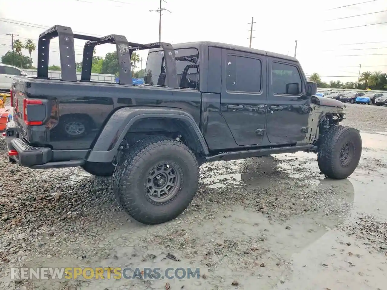 3 Photograph of a damaged car 1C6JJTBMXPL584877 JEEP GLADIATOR 2023
