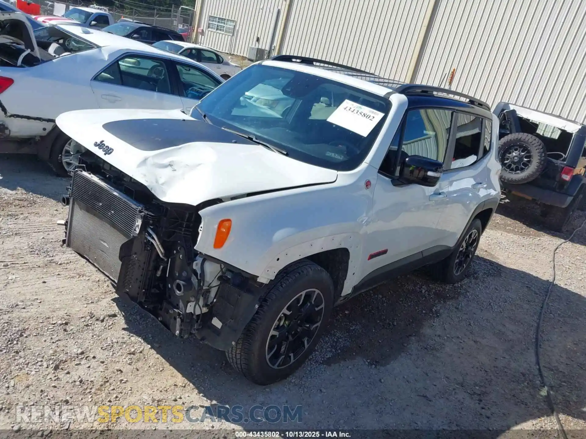 2 Photograph of a damaged car ZACNJDC12PPP60883 JEEP RENEGADE 2023