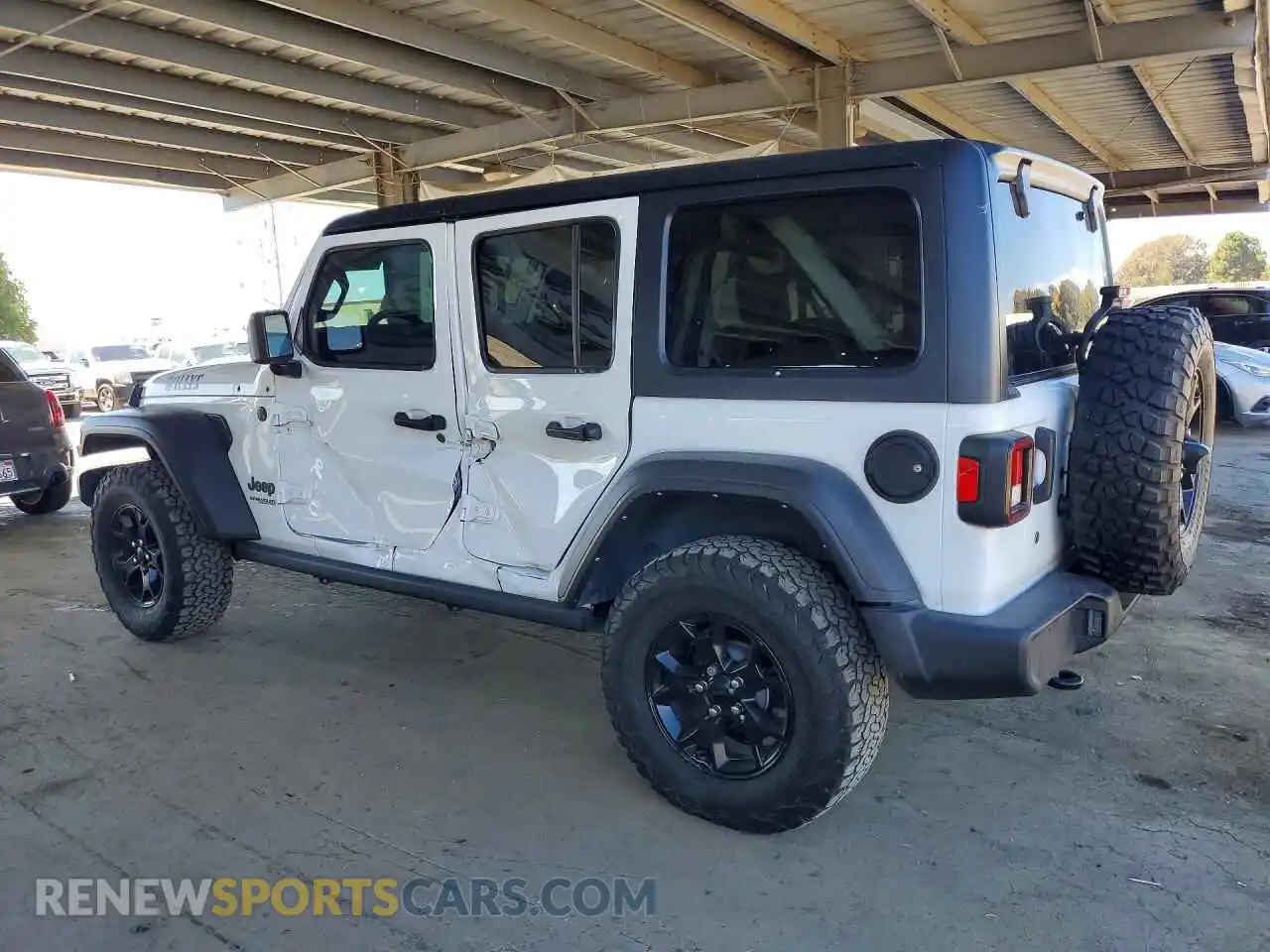 2 Photograph of a damaged car 1C4HJXDG2MW697688 JEEP WRANGLER 2021