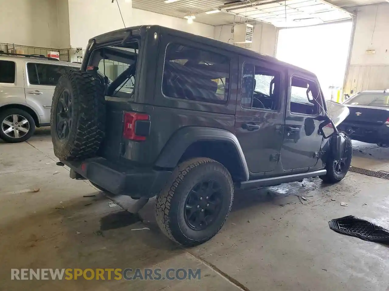 3 Photograph of a damaged car 1C4HJXDG6MW566201 JEEP WRANGLER 2021