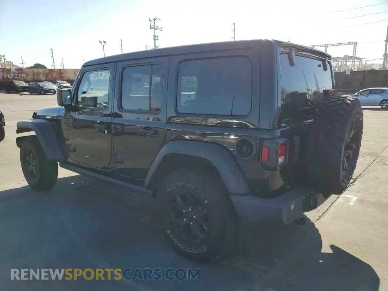 2 Photograph of a damaged car 1C4HJXDGXMW714608 JEEP WRANGLER 2021