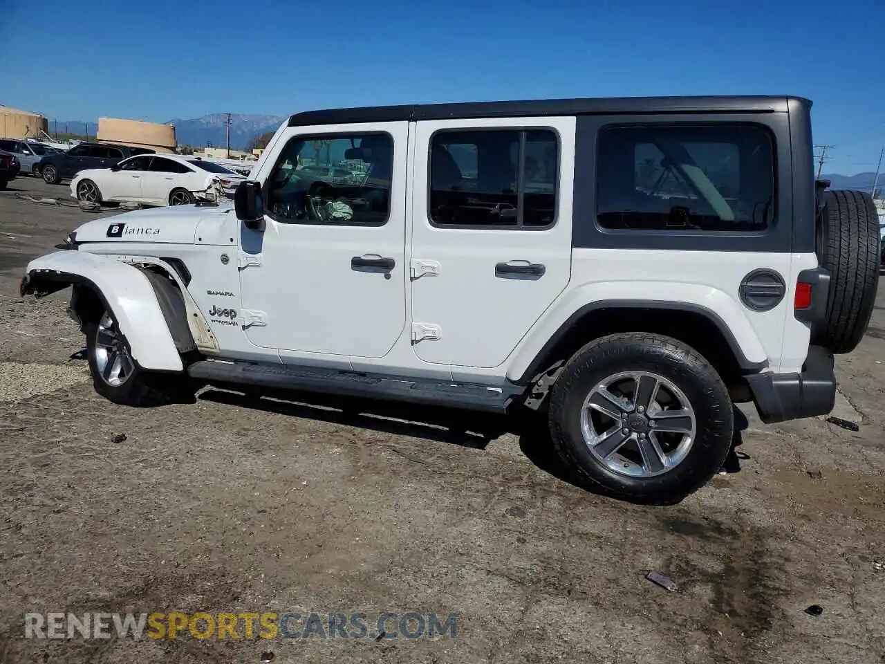 2 Photograph of a damaged car 1C4HJXEN0MW653329 JEEP WRANGLER 2021