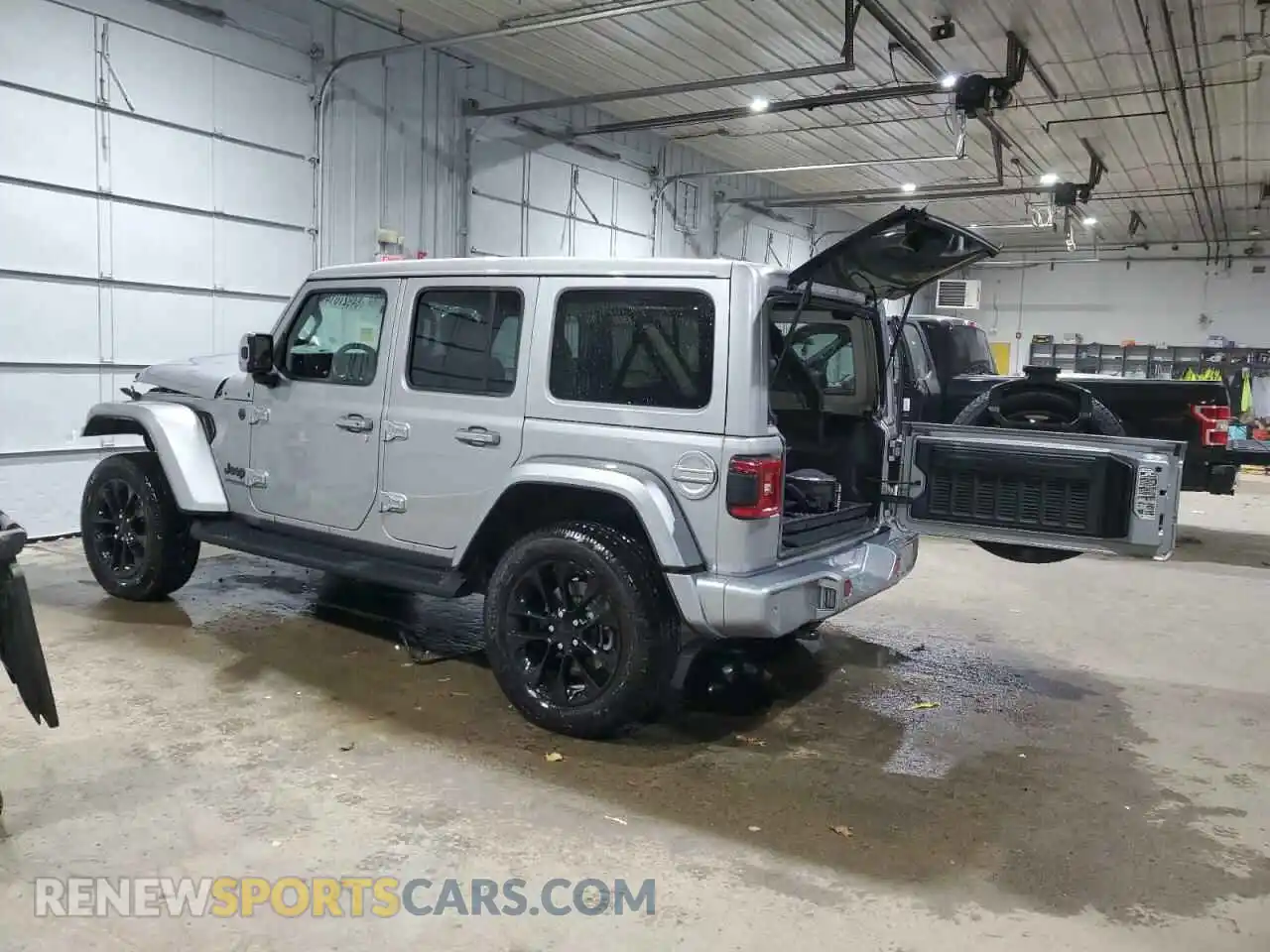 2 Photograph of a damaged car 1C4HJXEN1MW692690 JEEP WRANGLER 2021