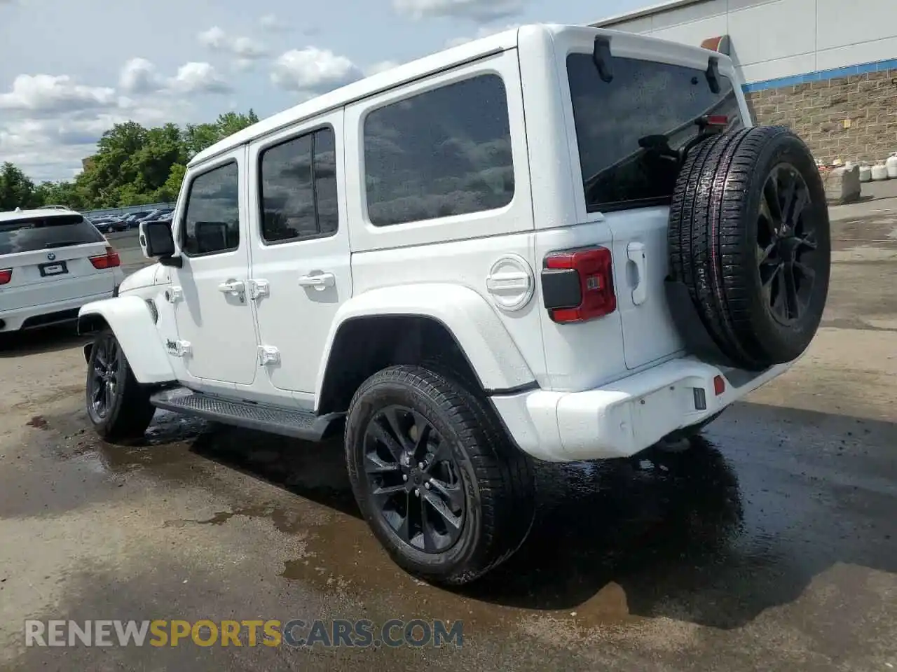 2 Photograph of a damaged car 1C4HJXEN2MW767414 JEEP WRANGLER 2021