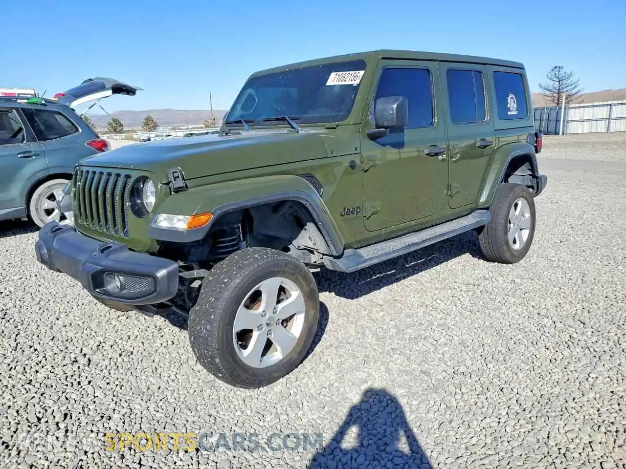 1 Photograph of a damaged car 1C4HJXEN8MW656916 JEEP WRANGLER 2021