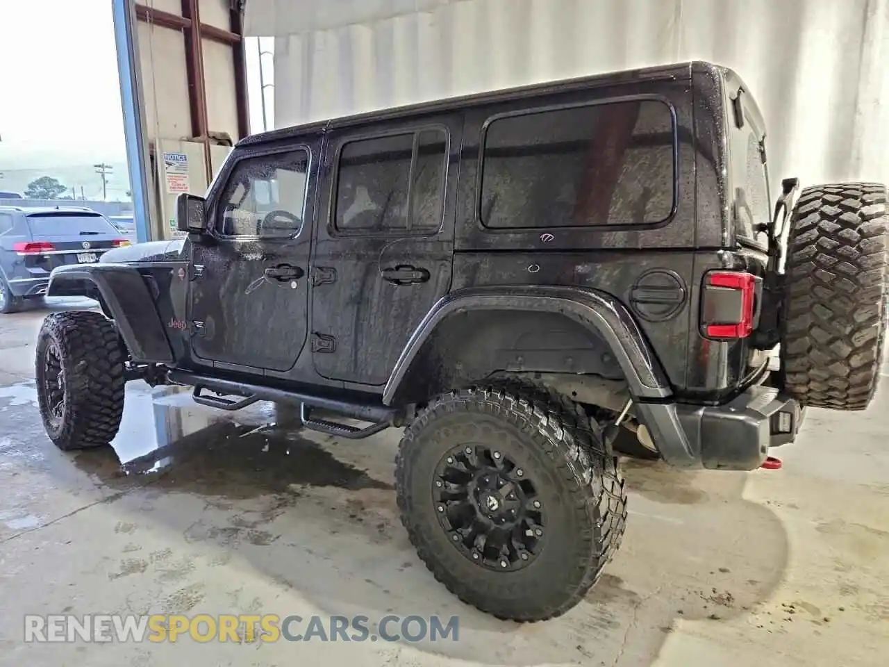 2 Photograph of a damaged car 1C4HJXFG2MW565043 JEEP WRANGLER 2021