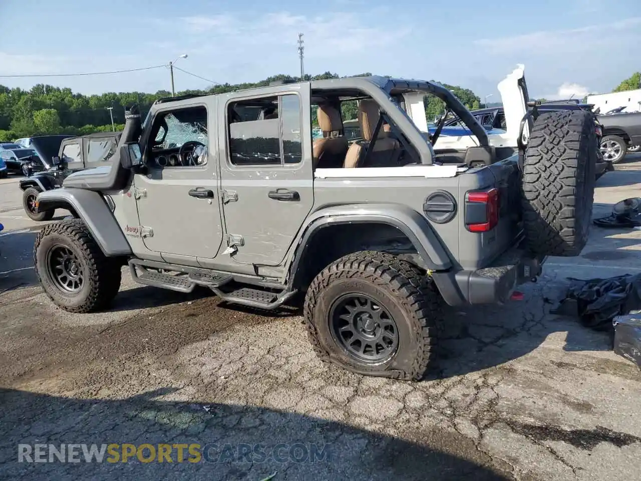 2 Photograph of a damaged car 1C4JJXFM0MW760386 JEEP WRANGLER 2021