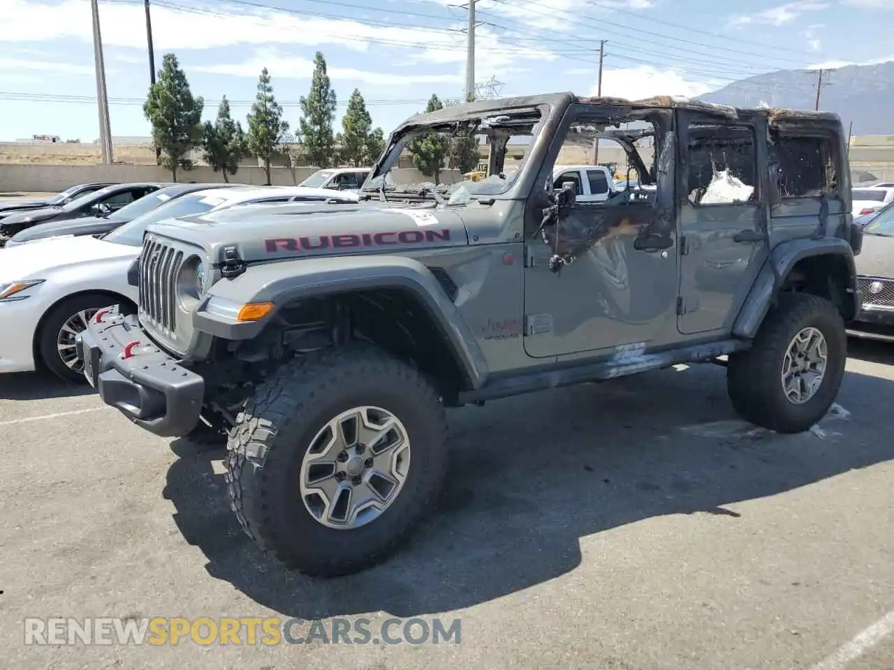 1 Photograph of a damaged car 1C4JJXFM9MW774562 JEEP WRANGLER 2021
