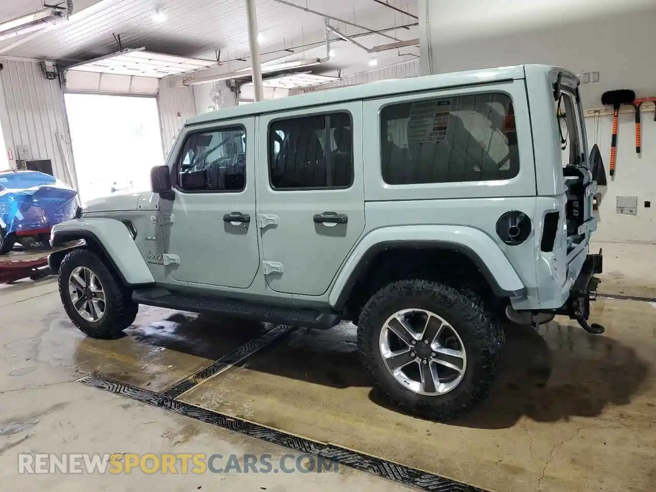 2 Photograph of a damaged car 1C4HJXEN0PW567006 JEEP WRANGLER 2023