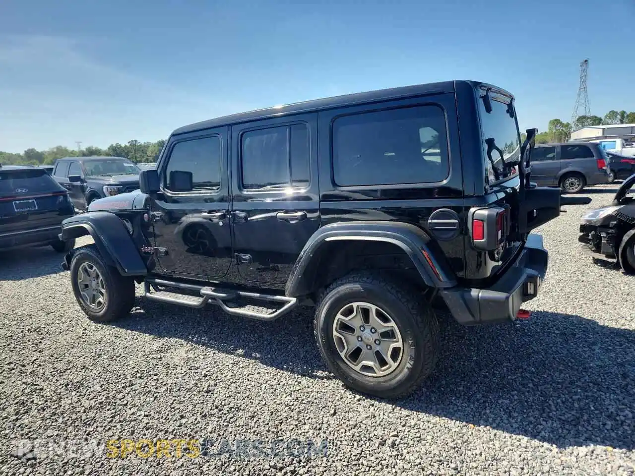 2 Photograph of a damaged car 1C4HJXFN2PW615006 JEEP WRANGLER 2023