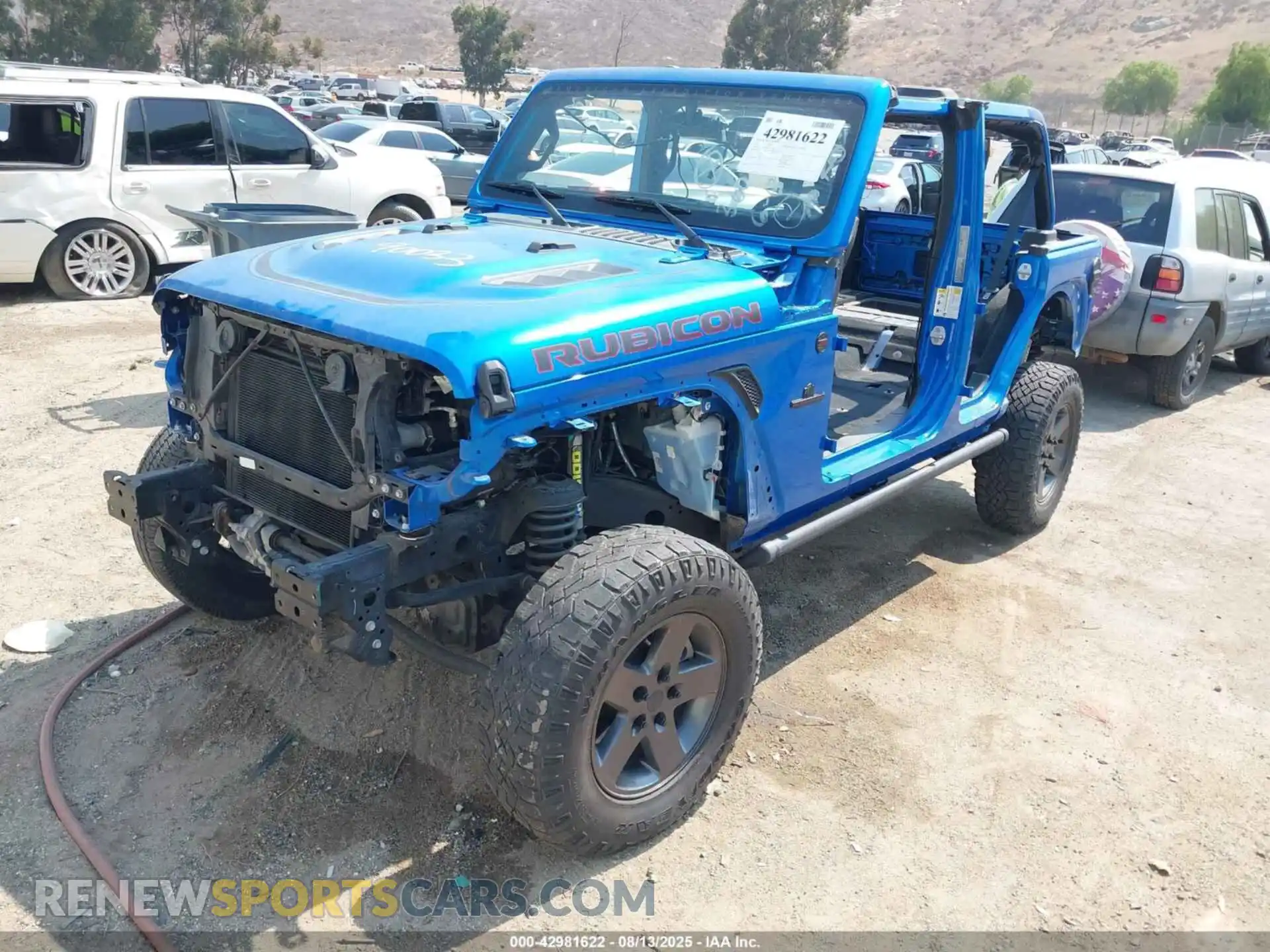 2 Photograph of a damaged car 1C4JJXFM0MW779522 JEEP WRANGLER UNLIMITED 2021