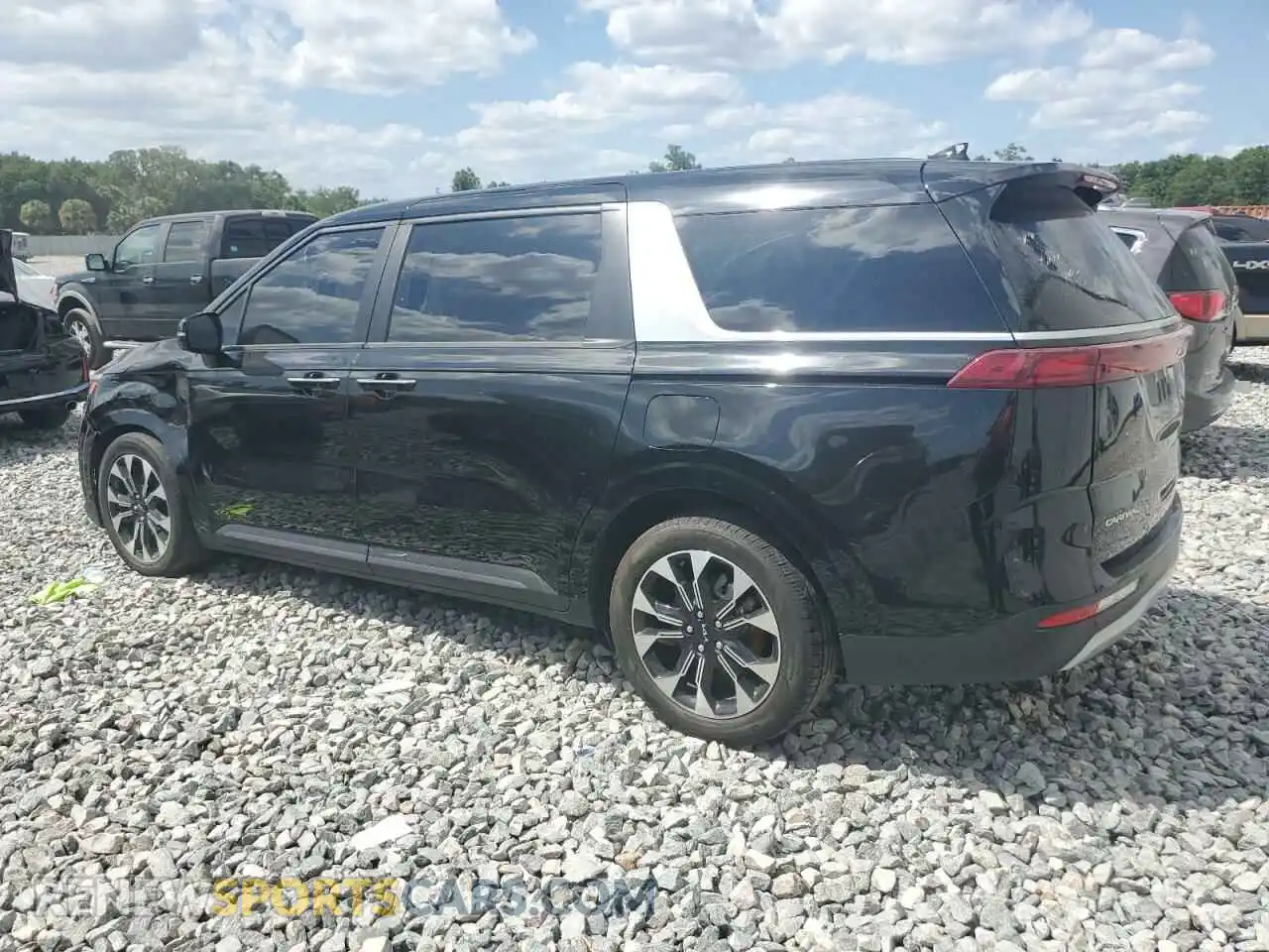 2 Photograph of a damaged car KNDNC5H39P6231933 KIA CARNIVAL E 2023