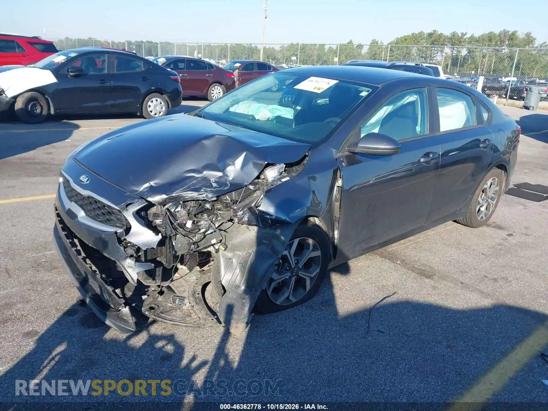 2 fotografías del automóvil dañado 3KPF24AD1ME360002 KIA FORTE 2021