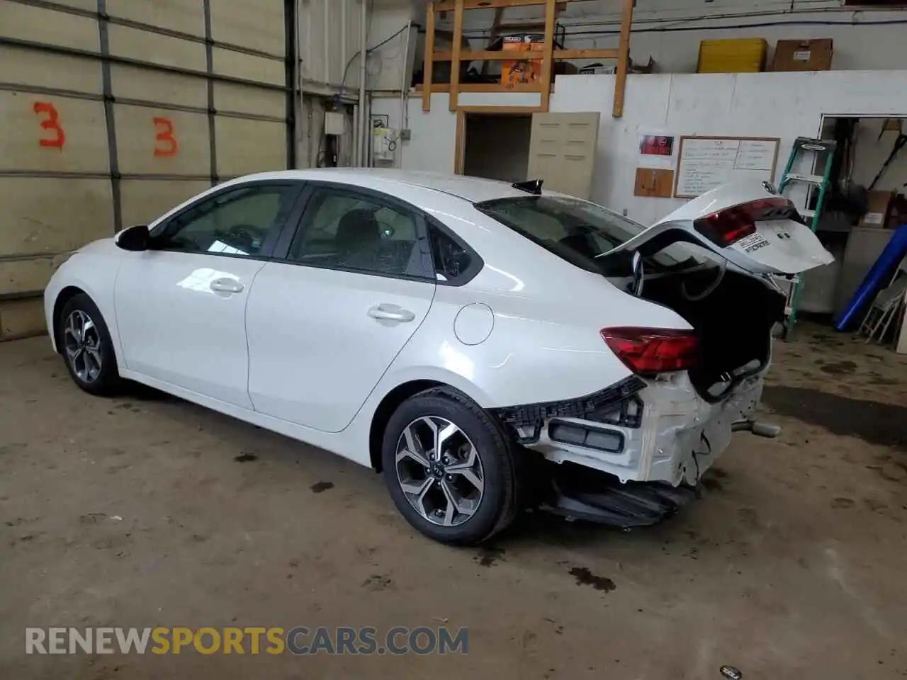 2 fotografías del automóvil dañado 3KPF24AD4ME311716 KIA FORTE 2021