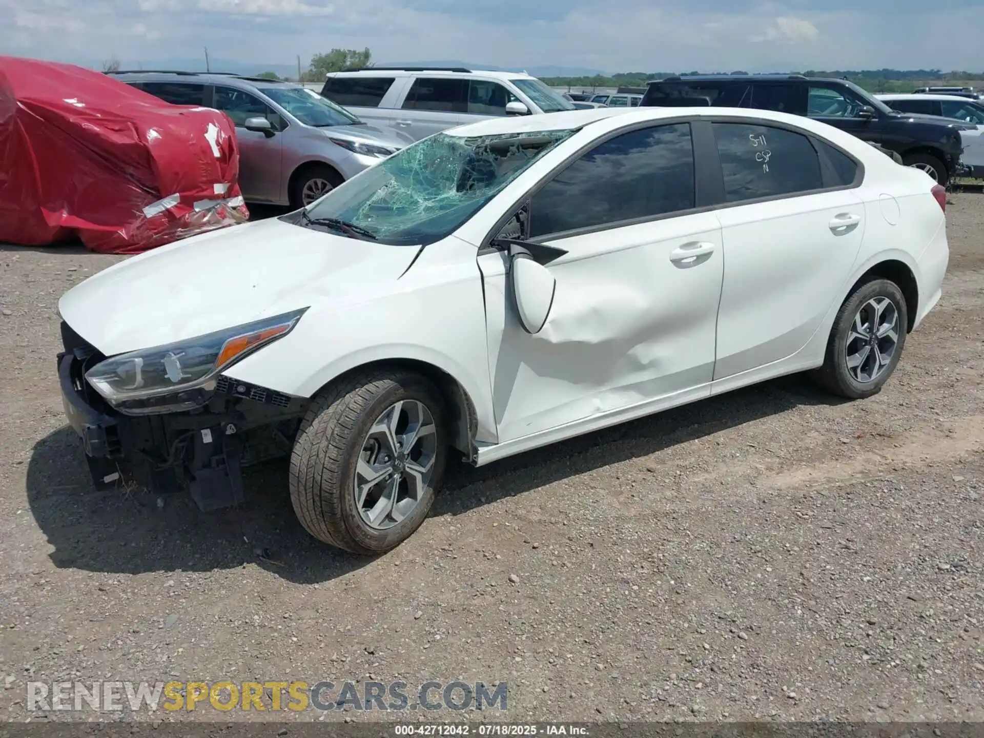 2 fotografías del automóvil dañado 3KPF24ADXME384671 KIA FORTE 2021