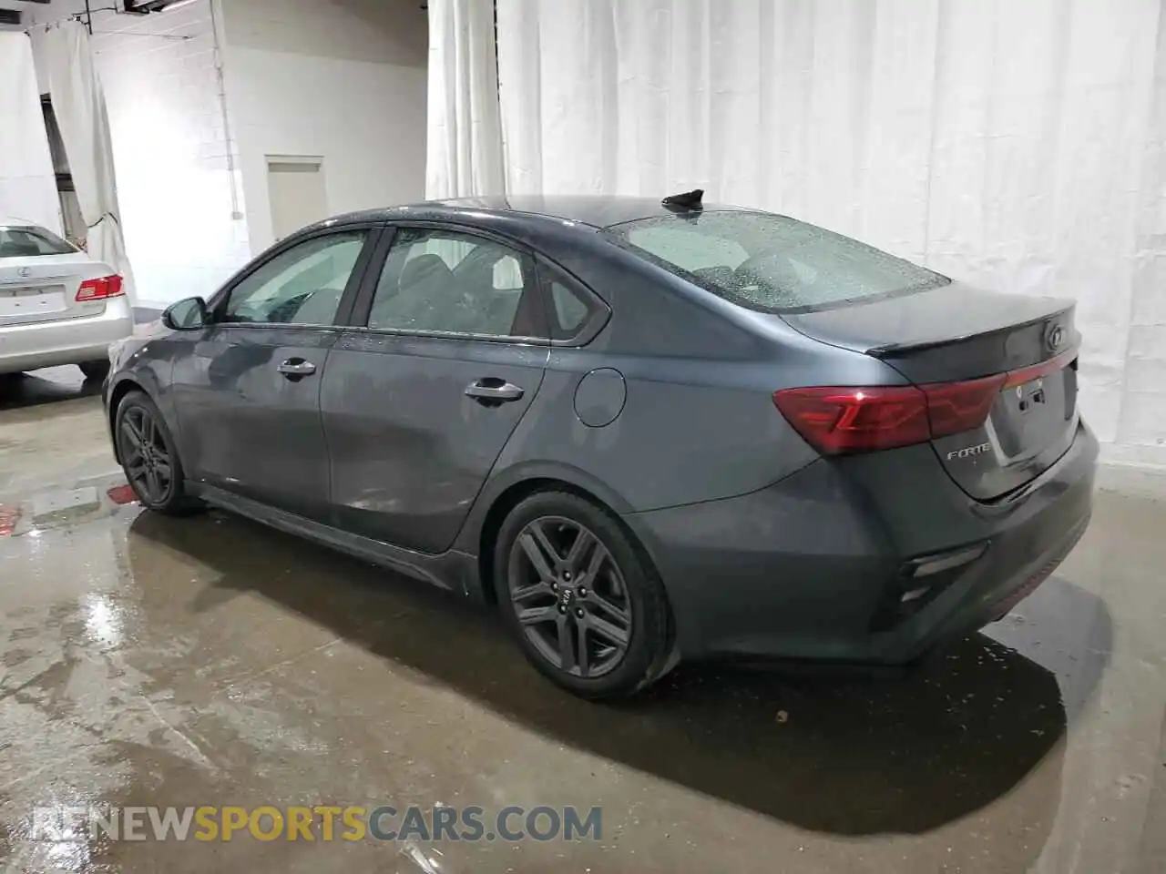 2 fotografías del automóvil dañado 3KPF34AD1ME382918 KIA FORTE 2021