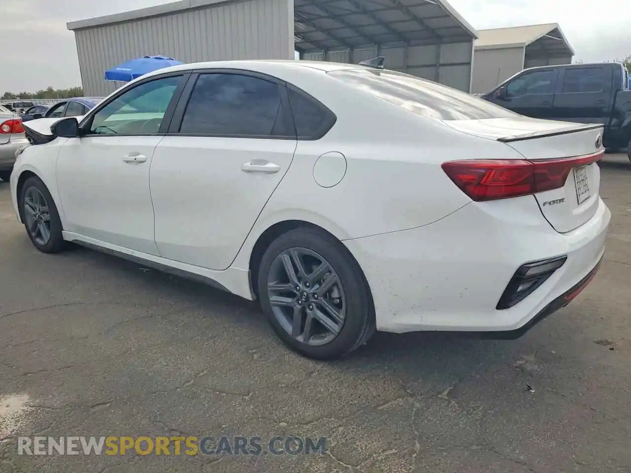 2 fotografías del automóvil dañado 3KPF34ADXME373649 KIA FORTE 2021
