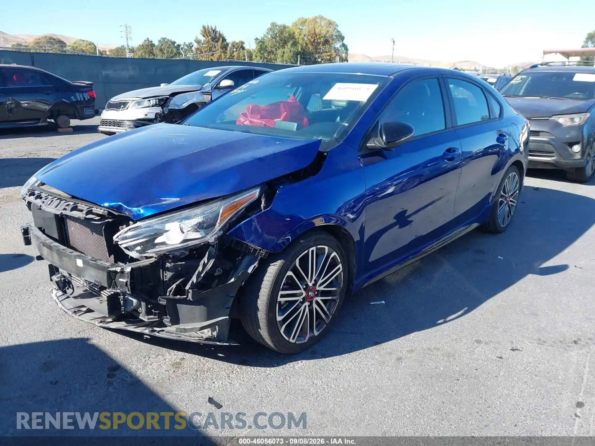 2 fotografías del automóvil dañado 3KPF44AC0ME313836 KIA FORTE 2021