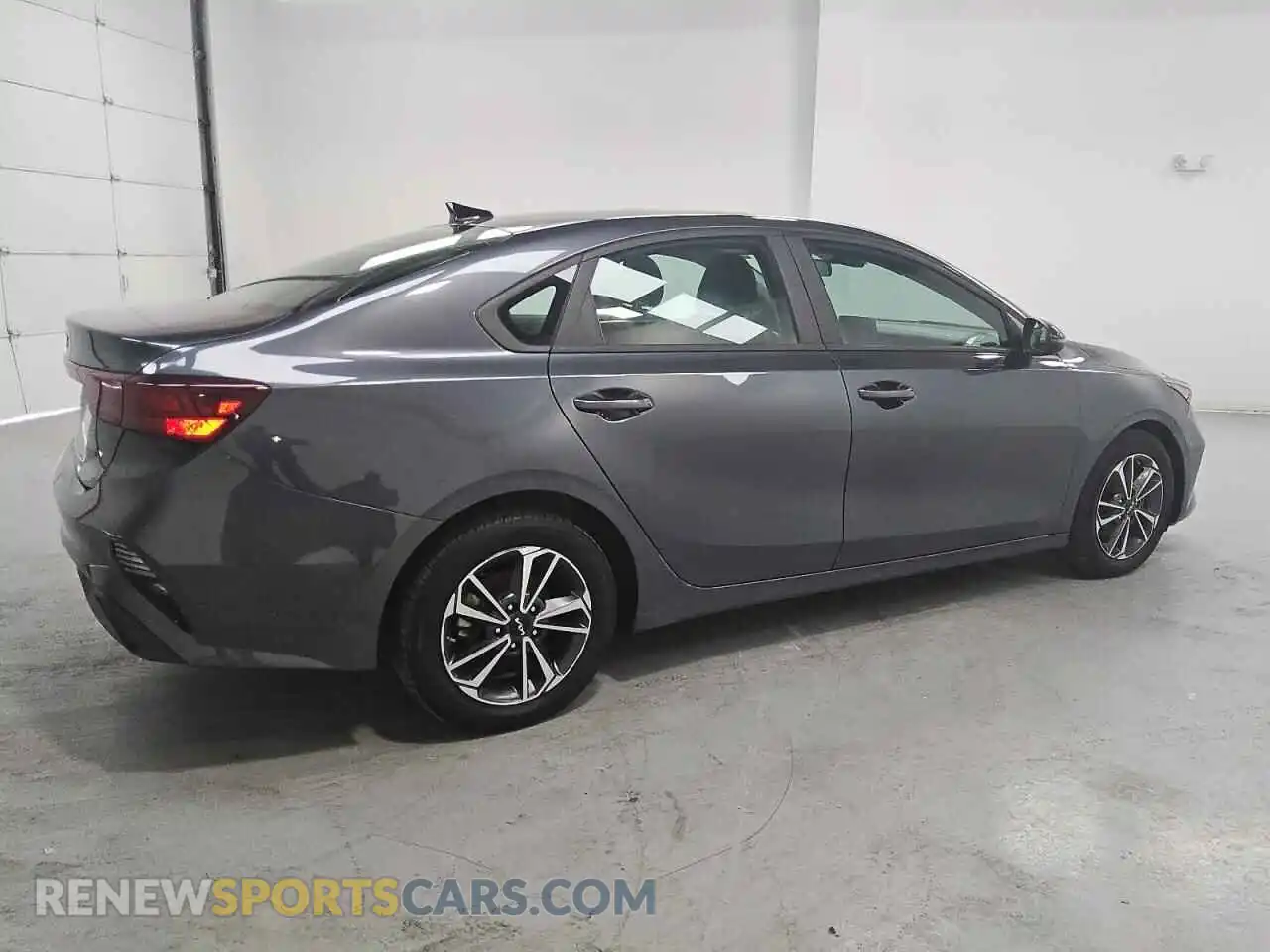 3 Photograph of a damaged car 3KPF24AD2PE614899 KIA FORTE 2023