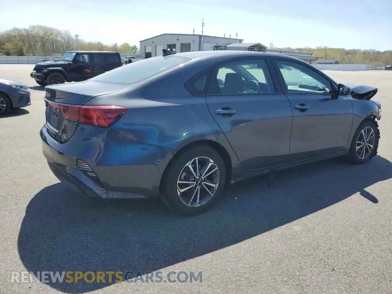 3 Photograph of a damaged car 3KPF24AD4PE557024 KIA FORTE 2023