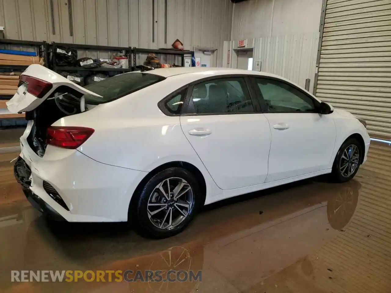 3 Photograph of a damaged car 3KPF24AD7PE600206 KIA FORTE 2023