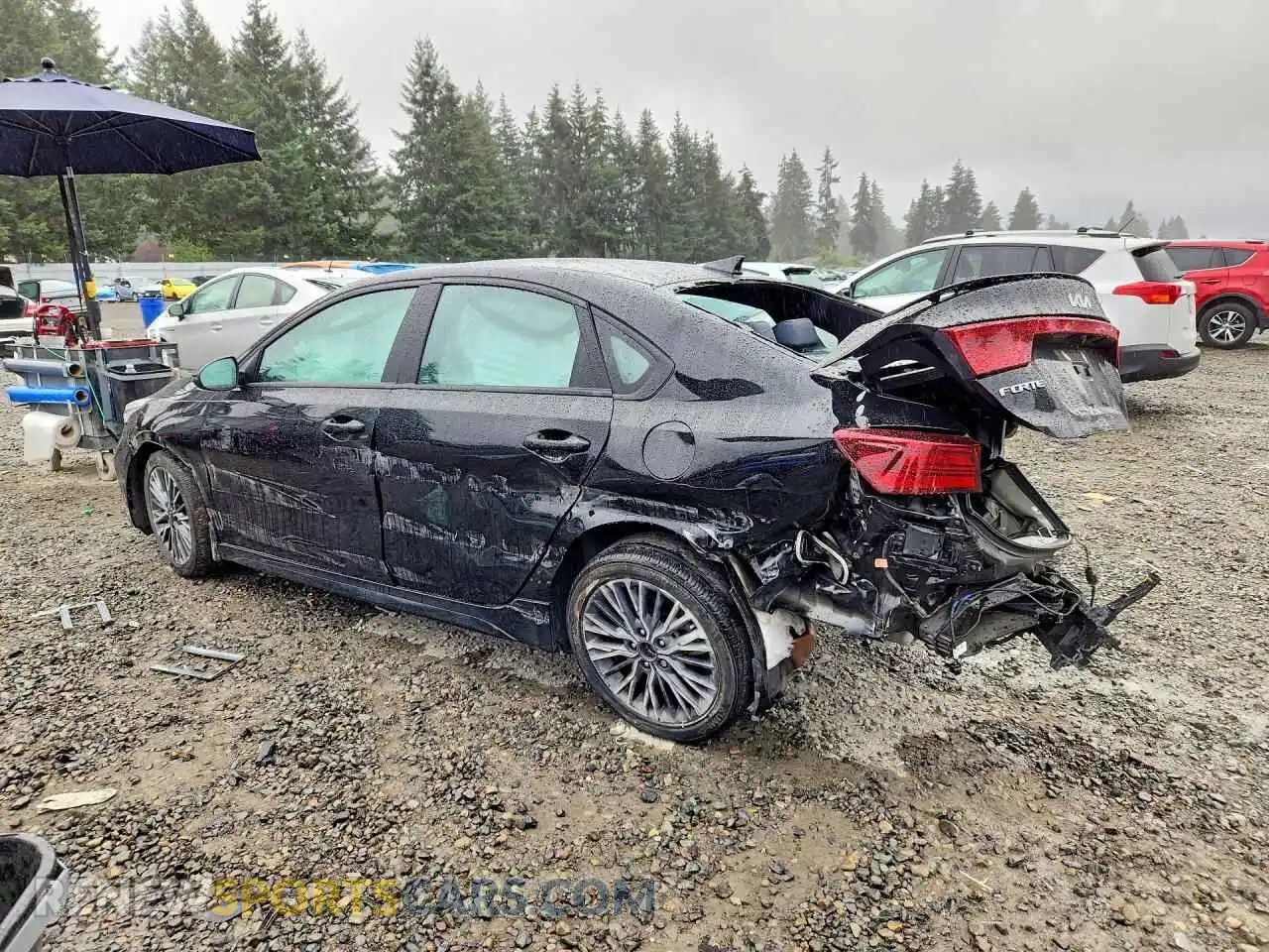 2 fotografías del automóvil dañado 3KPF54AD2PE539628 KIA FORTE 2023