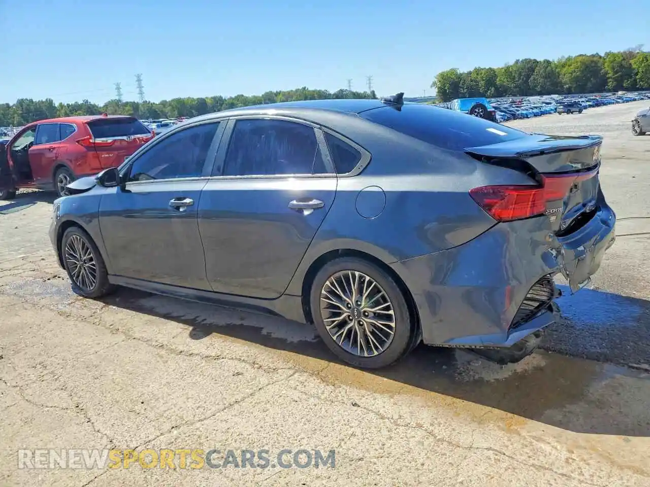 2 fotografías del automóvil dañado 3KPF54AD6PE513436 KIA FORTE 2023