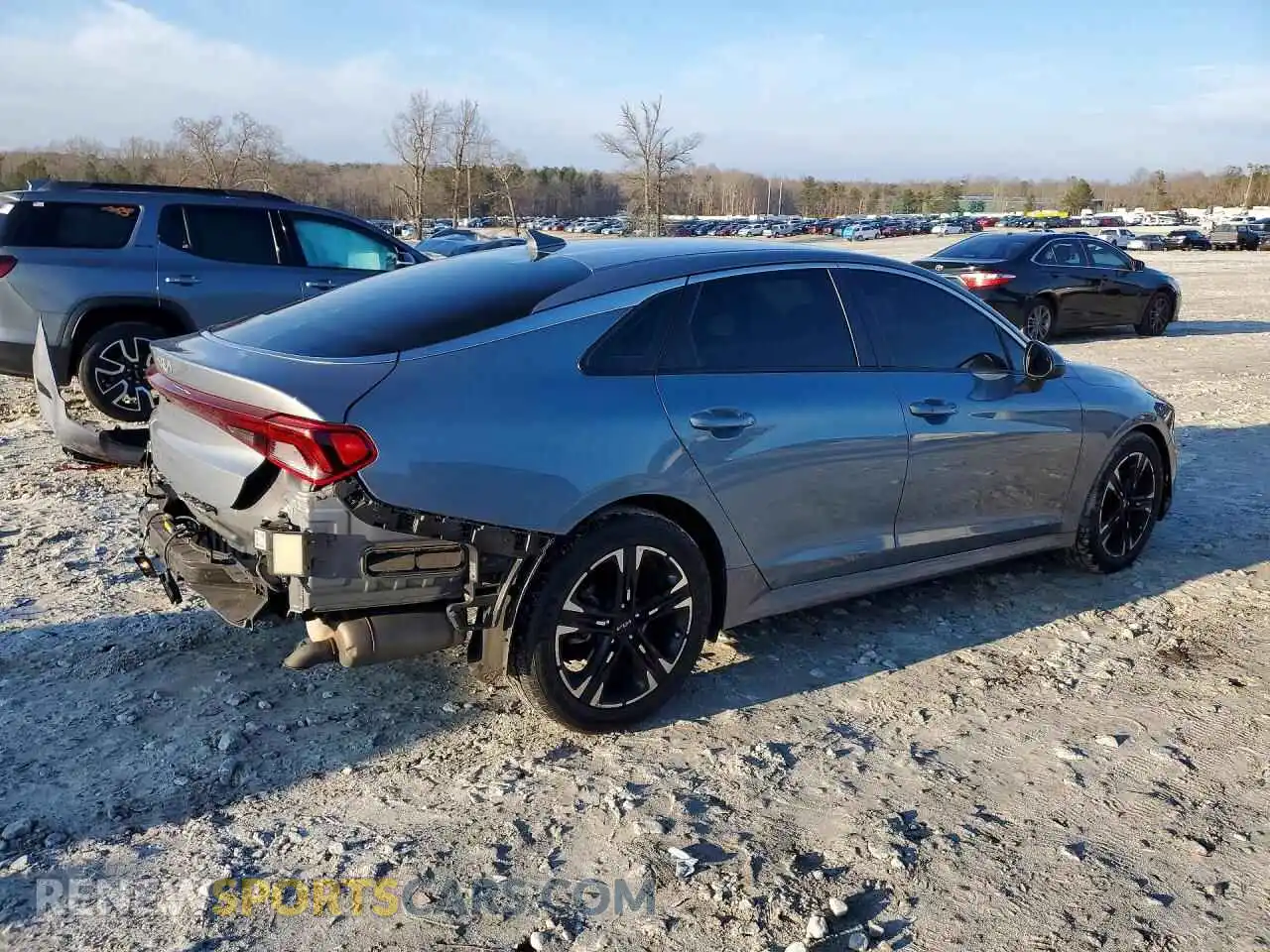 3 Photograph of a damaged car 5XXG14J27NG112402 KIA K5 2022