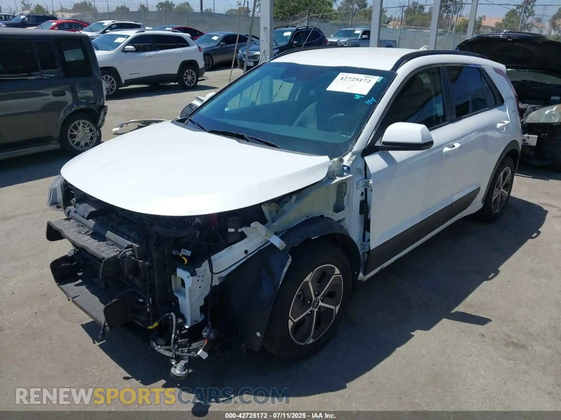 2 Photograph of a damaged car KNDCP3LE3P5088007 KIA NIRO 2023