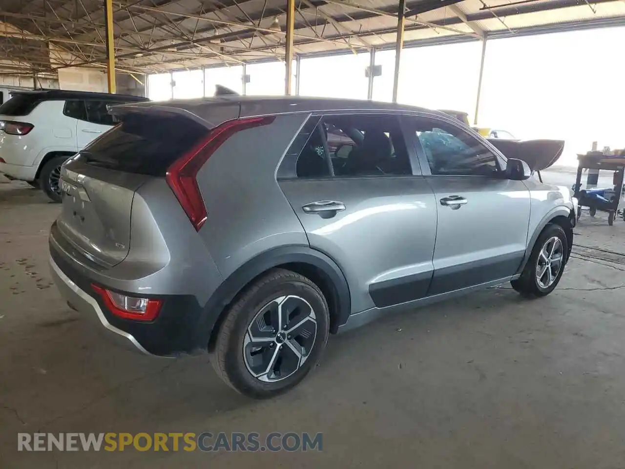 3 Photograph of a damaged car KNDCP3LE4P5082796 KIA NIRO 2023