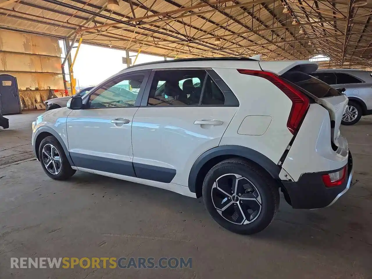 2 Photograph of a damaged car KNDCP3LE6P5110534 KIA NIRO 2023