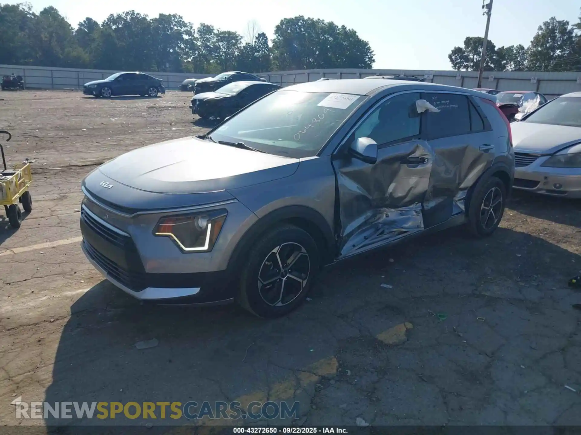 2 Photograph of a damaged car KNDCP3LE7P5064809 KIA NIRO 2023