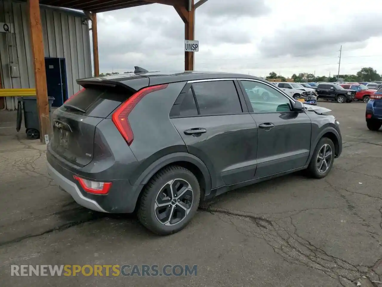 3 Photograph of a damaged car KNDCP3LE9P5116862 KIA NIRO 2023