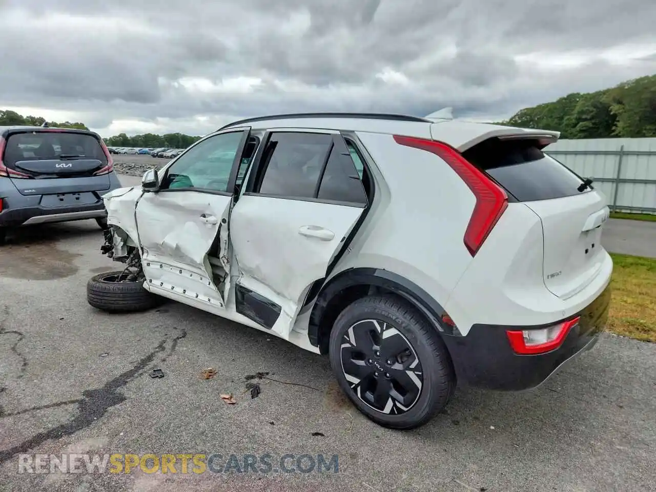 2 Photograph of a damaged car KNDCR3L10P5052976 KIA NIRO 2023