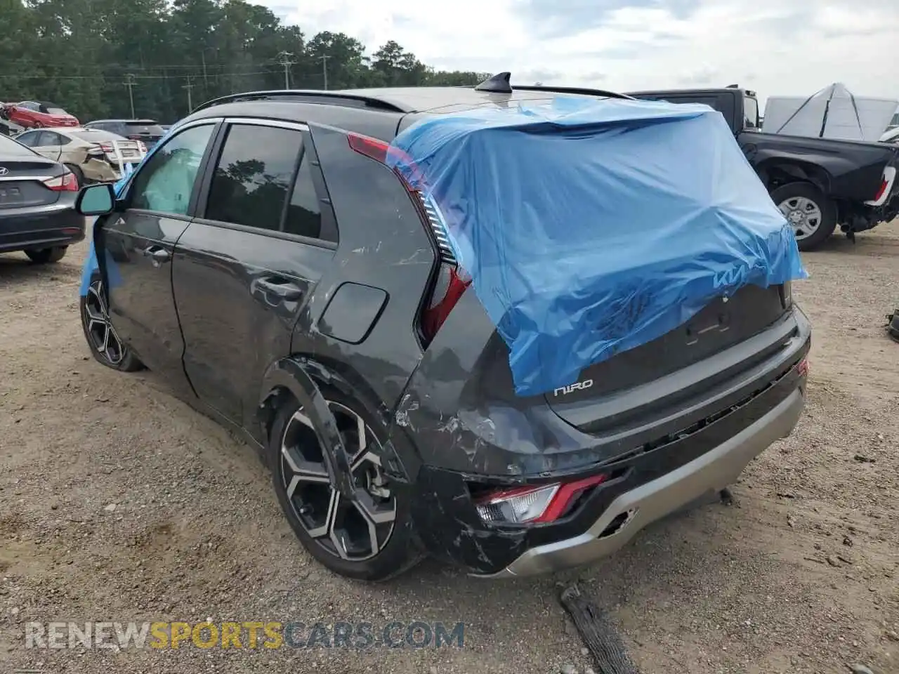 2 Photograph of a damaged car KNDCR3LE0P5098102 KIA NIRO 2023