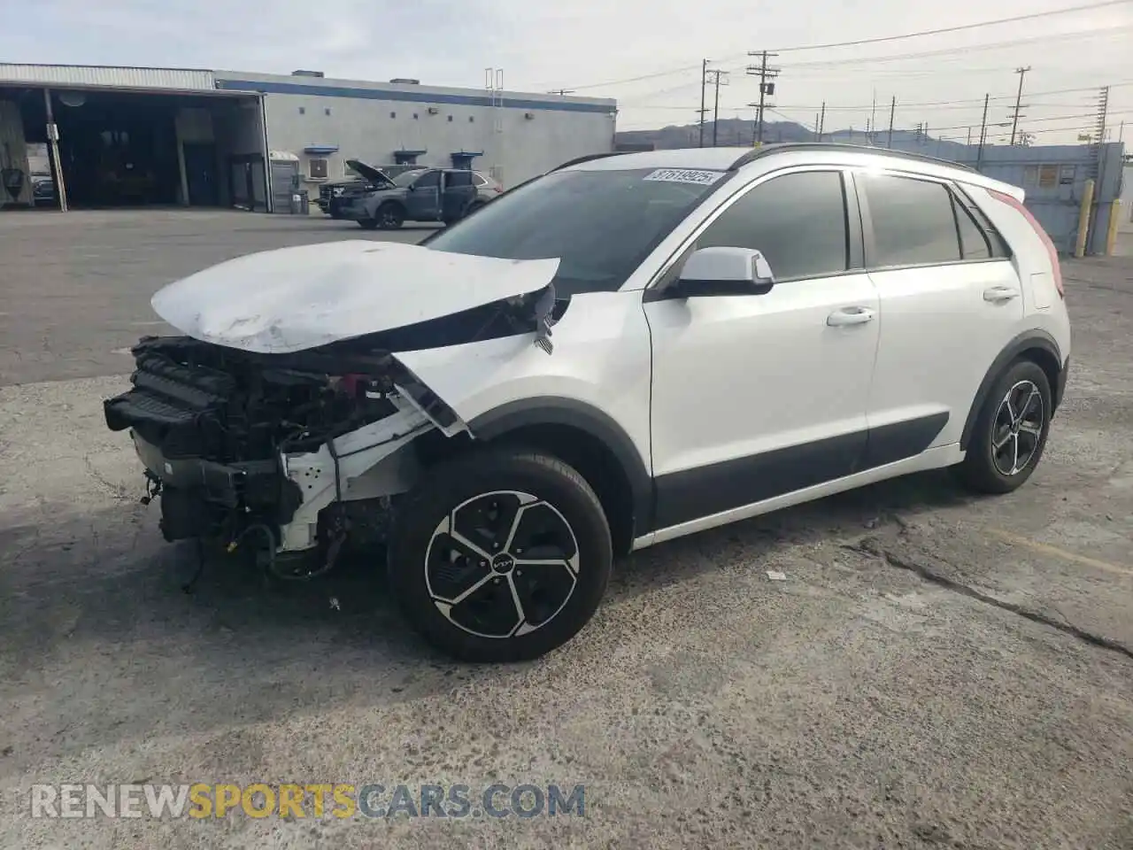 1 Photograph of a damaged car KNDCR3LE2P5073492 KIA NIRO 2023