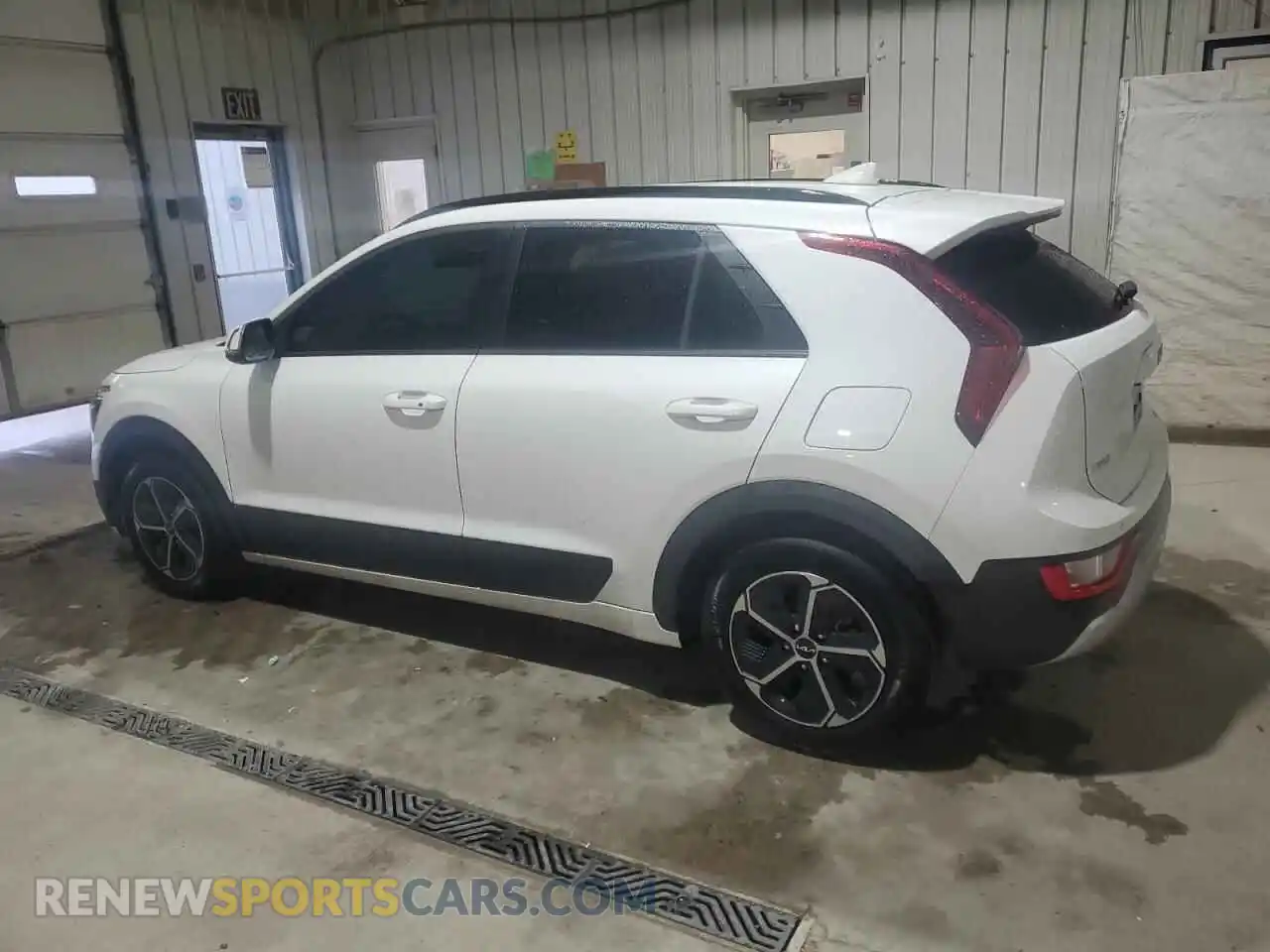 2 Photograph of a damaged car KNDCR3LE7P5047079 KIA NIRO 2023
