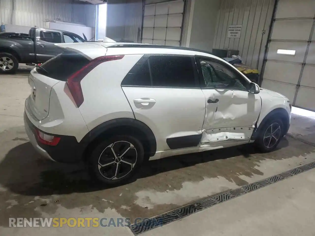 3 Photograph of a damaged car KNDCR3LE7P5047079 KIA NIRO 2023