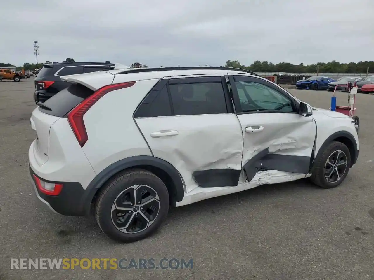 3 Photograph of a damaged car KNDCR3LE7P5080907 KIA NIRO 2023