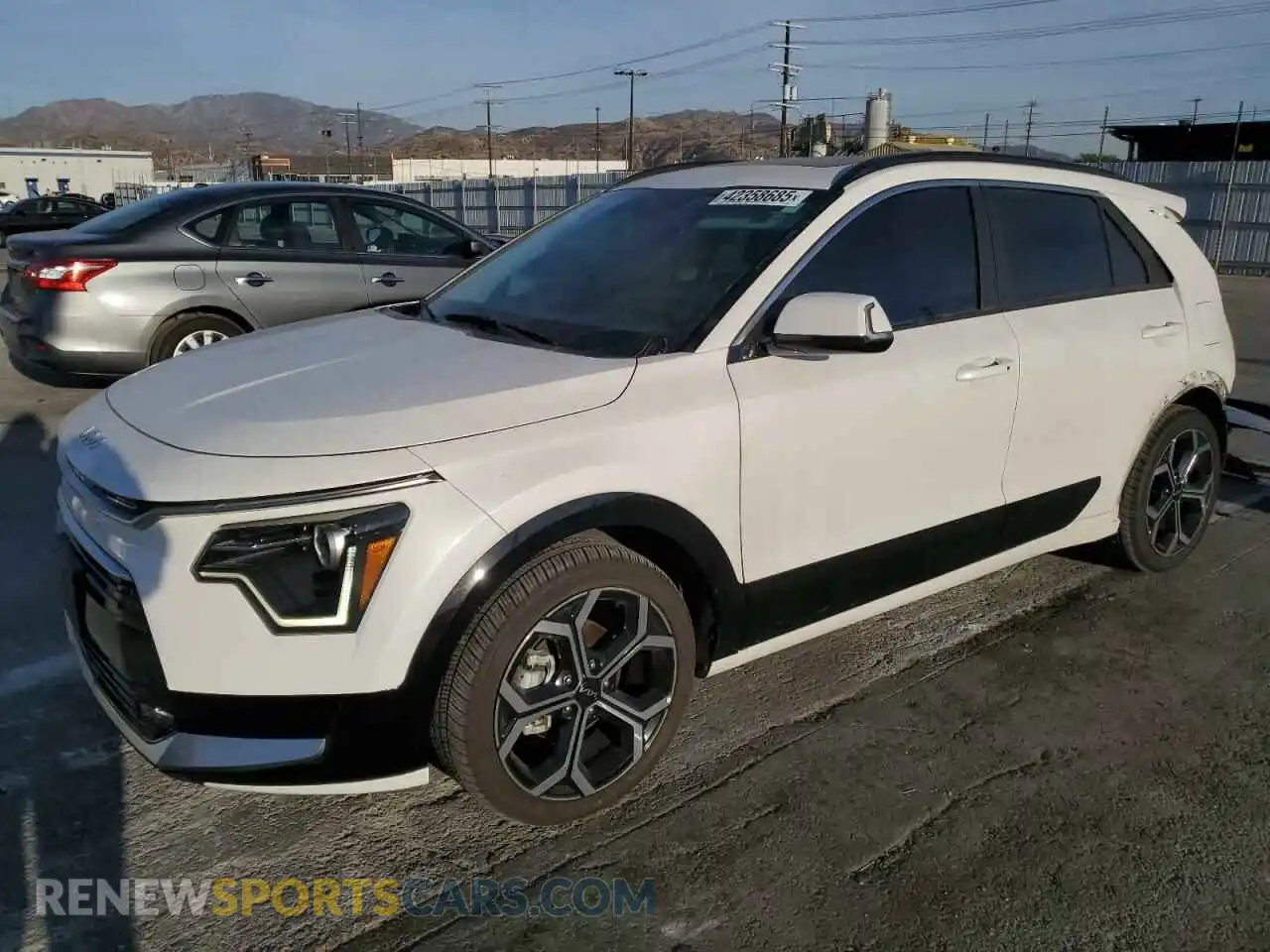 1 Photograph of a damaged car KNDCR3LE7P5100007 KIA NIRO 2023