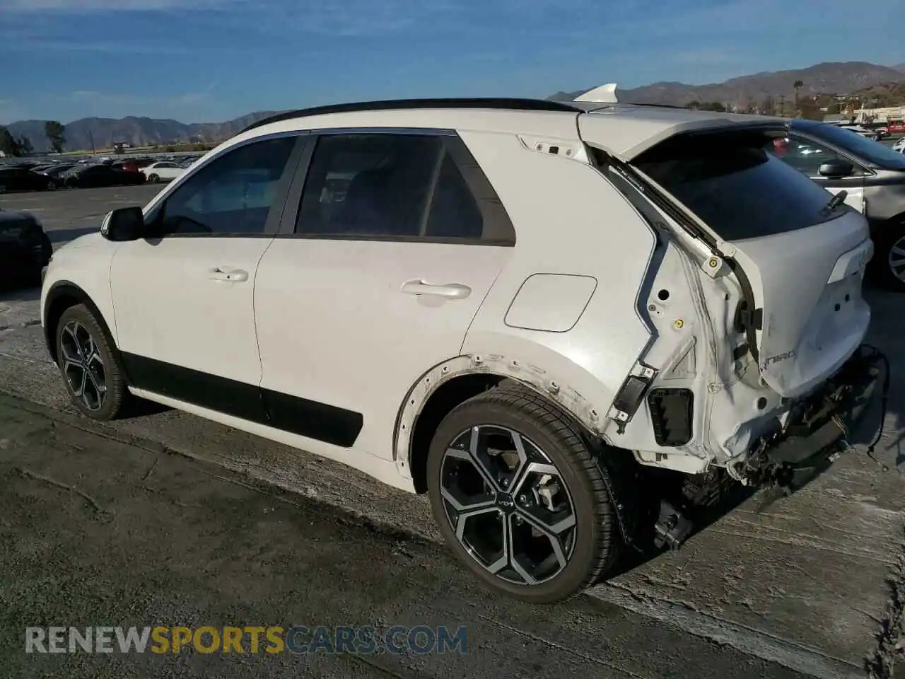 2 Photograph of a damaged car KNDCR3LE7P5100007 KIA NIRO 2023