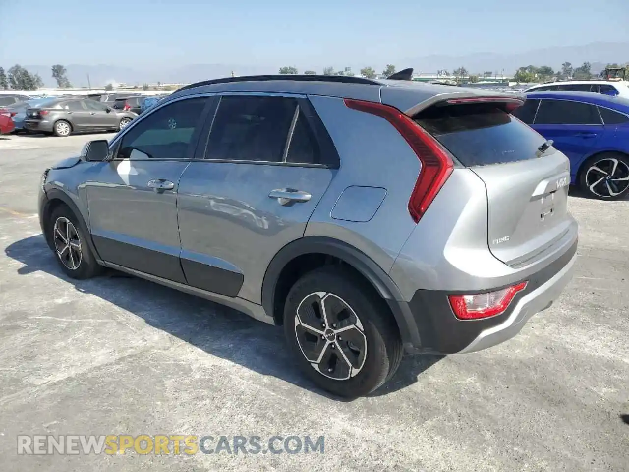2 Photograph of a damaged car KNDCR3LEXP5043513 KIA NIRO 2023