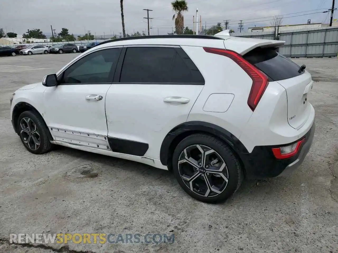 2 Photograph of a damaged car KNDCR3LEXP5043589 KIA NIRO 2023
