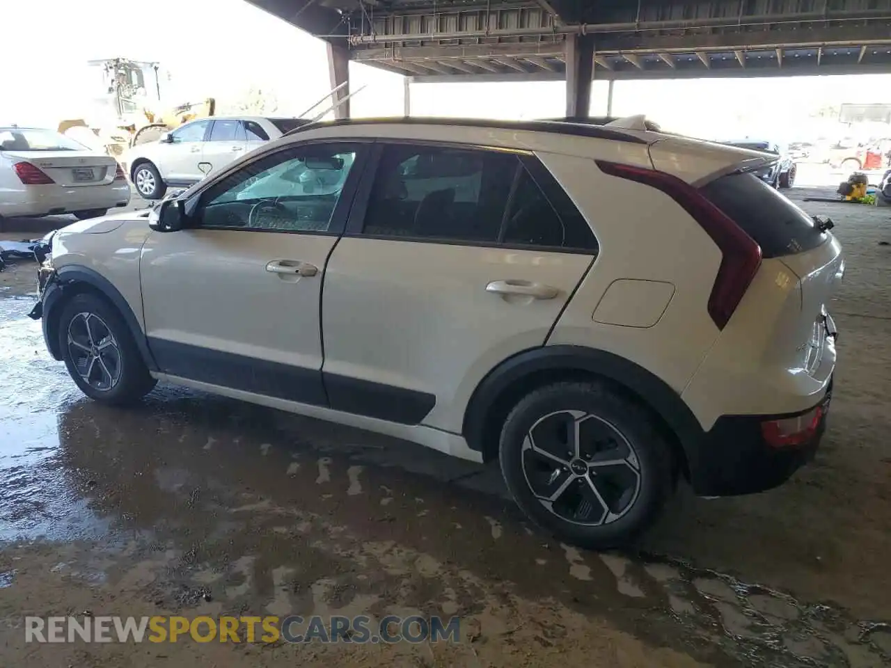 2 Photograph of a damaged car KNDCR3LEXP5046699 KIA NIRO 2023